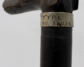 Metal marking on gun cane
