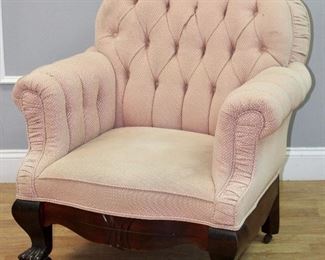 Carved foot upholstered chair