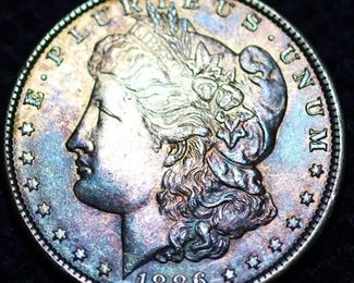 1886 Morgan silver dollar w/rainbow toning