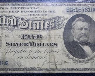 1891 US Five dollar silver certificate , has 3 pin holes.                                                        