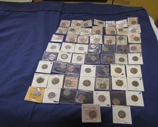 Uncirculated and Proof Nickels a total of 58. Dates start in 1950s and latest 1990s. There may be more than a single coin for a single year. Items from an estate.