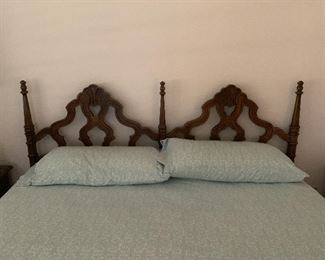King Bedroom Set is marked to sell.   Kind head board, long dresser, tall dresser, armoire and two night stands.   The tops of the dressers have damage and pricing as project furniture. 