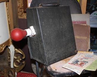 This is a radio tube tester, from  back in the day when radios used tubes.  We have over 500 tubes for sale.  