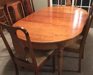 19th century cherry table with 2 leaves and 6 chairs