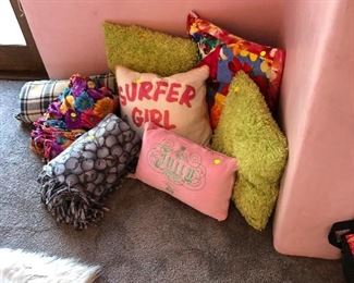 fun pillows in girl's room upstairs