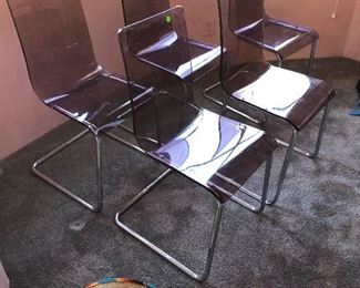 fun purple tinted acrylic chairs