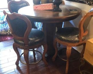 bar top table & 4 blue leather embossed swivel bar stools