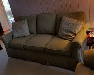 Bassett green cloth sofa and matching loveseat