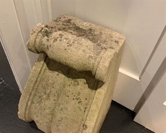 An incredible antique corbel off a building