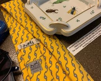 Close up of the Hermes tie and vintage ashtray