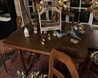 Antique small drop leaf table with sets of chairs perfect for a small meal or a game of cards