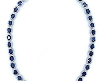 Lovely 14K White Gold Ladies Custom Diamond and Blue Sapphire Necklace. All natural oval cut sapphire set in 4 prongs setting with round brilliant cut natural diamonds. All fine cutting and proportions, all prongs setting style. Natural Sapphire: 35.82 cts. 42 count. Oval Cut. Approximately 7 x 5 mm. "Diffused" quality bue sapphire, fine cut and clarity. lNatural Diamonds: Round brilliant cut. 9.75 cts. G/H Color. I Clarity Total Weight: 45.57 CTS TW  Length: 16 in. Condition: Fine, Very Good IAS Appraisal Included

