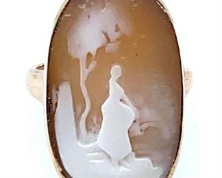 Antique yellow gold ring with delicate oval shell cameo.  Size: 4 Condition: cameo with wear, otherwise good
