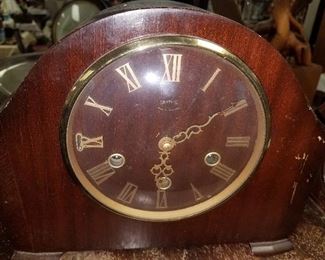 Nice selection of clocks. Smith's "Made in England" mantle clock