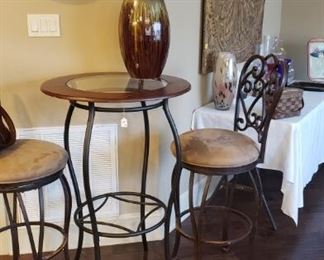 mirror, round pub table, two bar chairs