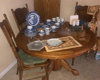Round table with leaf and 4 press back chairs