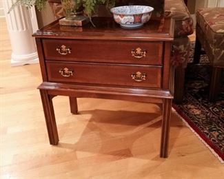 This two-drawer cherry table is by Lane