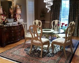 A view of the table and chairs with the table top cleared