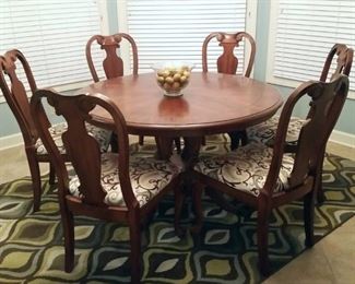 Cherry  dining table with six chairs