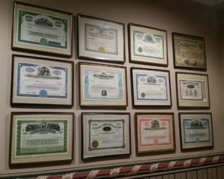 Framed vintage and antique stock certificates
