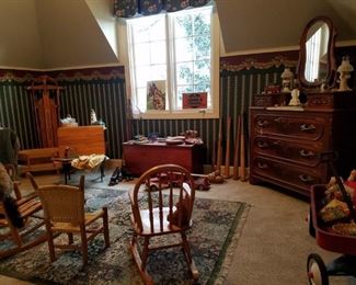You'll find some antiques, vintage items, and mid-century items in this room