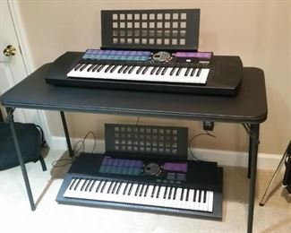Two Yamaha electronic keyboards