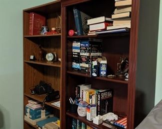 2 bookshelves and books. 