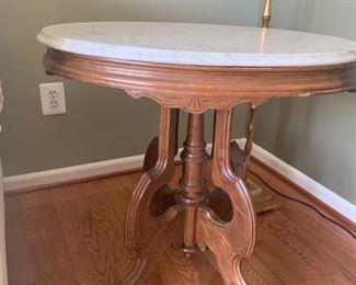 Eastlake oval marble top table