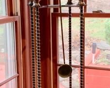 20. Whimsical Metal Clock (12" x 75" x 12")