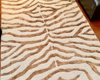 75. Hand Tufted Beige and Brown Rug (4' x 6')