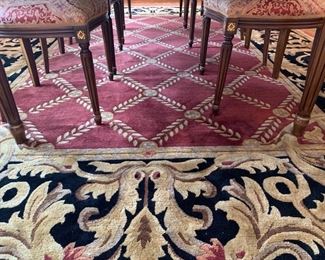 25. Wool and Silk Black Burgundy and Tan Rug (8'10" x 12')