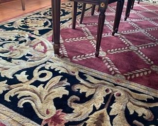 25. Wool and Silk Black Burgundy and Tan Rug (8'10" x 12')