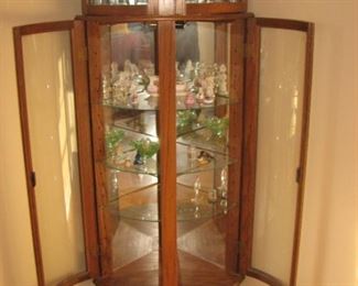 Curved glass curio cabinet