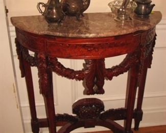 Rose marble top demi-lune table