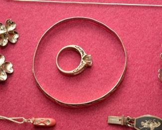 sterling necklace with ballerina slipper, sterling dogwood pins, sterling bangles, and sterling rings