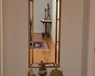 large wall mirror, table