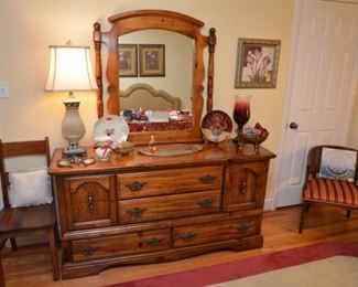 dresser with mirror, lamp, single chairs