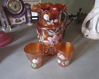 Carnival glass pitcher and 2 glasses