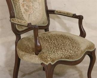 Vintage velvet carved arm chair