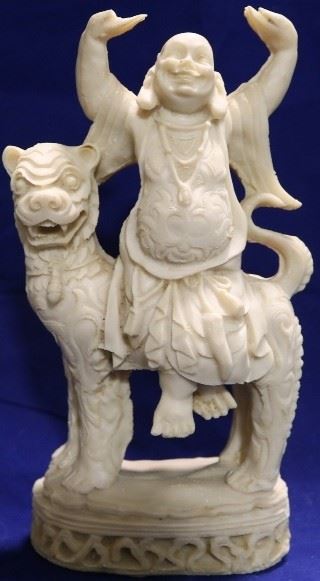 Oriental carved statue