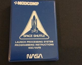 NASA Space Shuttle MODCOMP Launch Processing System Programming Instructions, 4" W x 5 1/2" H. Reference Date of 1975.