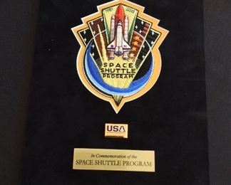 United Space Alliance Commemorative Package for the successful completion of the NASA Space Shuttle Program. Package includes Commemorative Book that examines the accomplishments of the Space Shuttle Program, Commemorative Video, and a matted "End of Space Shuttle Program" suitable for framing. Enclosed in an embossed slip case.