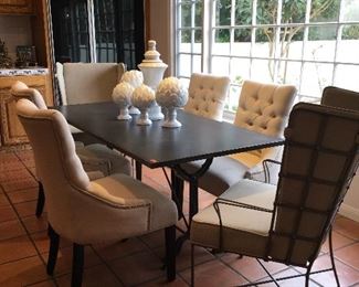 Iron dining table $399 - Oatmeal flax dining chairs $69 each - Grey metal wing chairs $399 each - art and accessories all avail