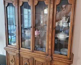 breakfront cabinet $450 with glass shelves and storage