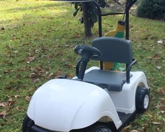 Childs golf cart with a new battery.