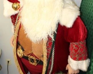 Six foot Santa with his elf, Shinny Upatree.