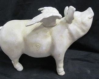 Flying pig bank cast iron
