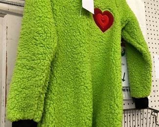 Slightly used Grinch suit whose heart was 3 sizes too small but alas it grew & this shows he had one ...heart