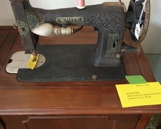 White vintage sewing machine, nice cabinet, good shape, really nice iron casting