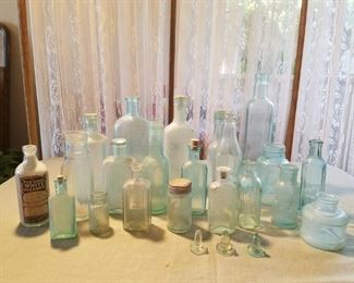 Light blue glass bottles